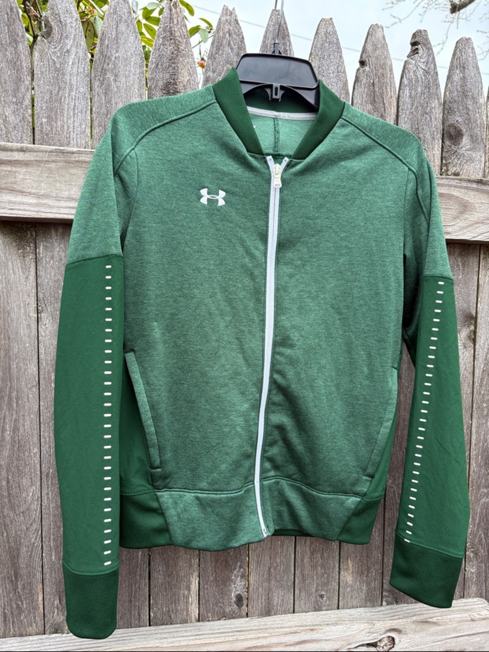 Under Armour small zip performance jacket.